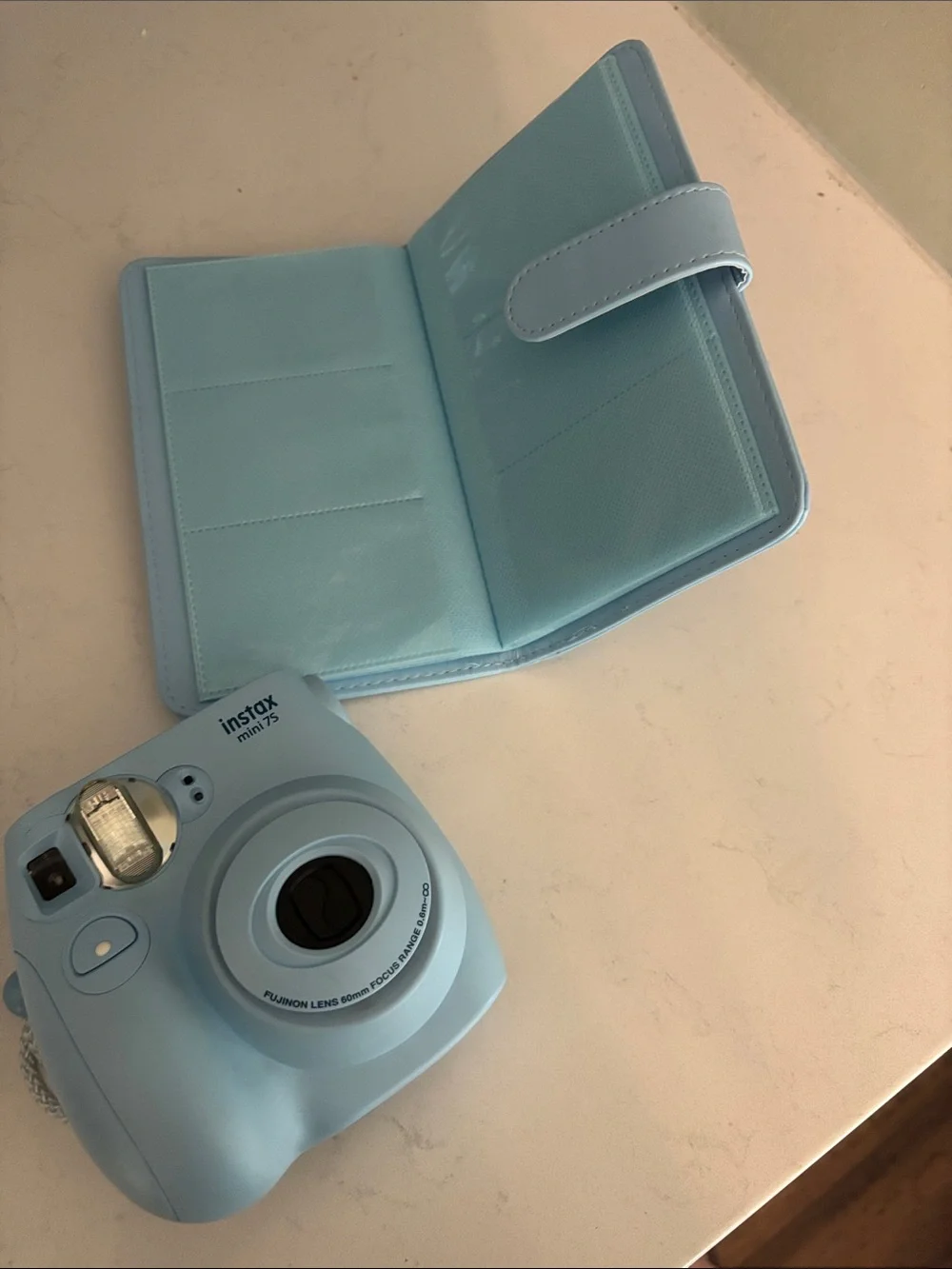 Fujifilm Instax Mini Camera with Light Blue Case and Album